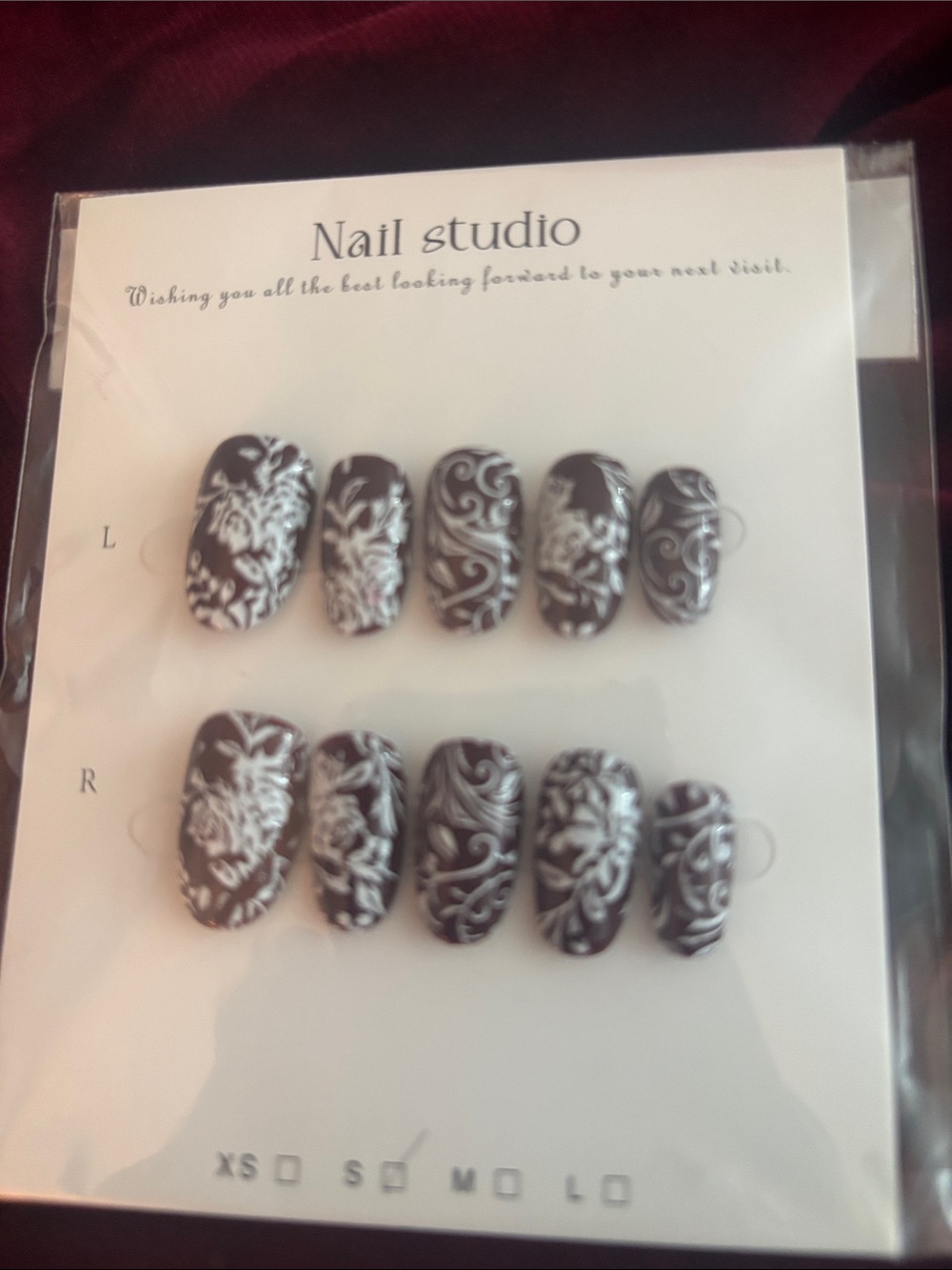Black Press-On Nails with White Floral Filigree